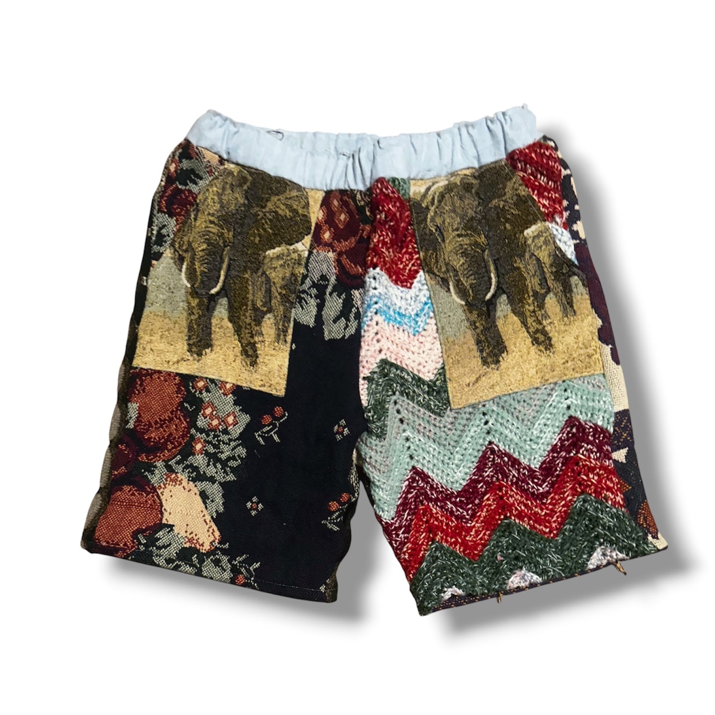 Colorful shorts with elephant patterns on a white background