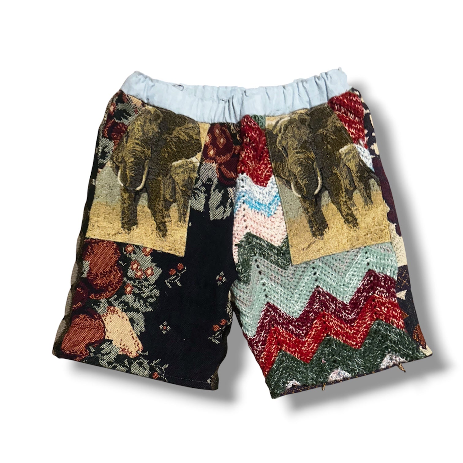 Colorful shorts with elephant patterns on a white background